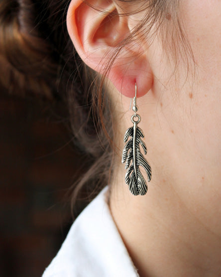 silver feather earrings